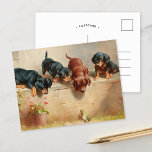 Carte Postale Curieux Chiots Dachshund | Carl Reichert<br><div class="desc">Curieux chiots de dachshund et une grenouille | Le charmant tableau de Carl Reichert Curious Dachshund Puppies and a Frog saisit un moment ludique, où quatre adorables chiots dachshund se rassemblent curieusement autour d'une petite grenouille. La description détaillée des visages expressifs et des postures animées des chiots, associée à un...</div>