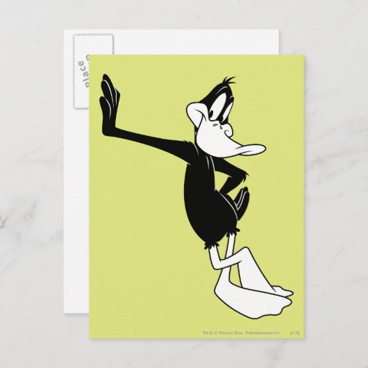 Carte Postale DAFFY DUCK™ penché contre un mur (Devant / Derrière)