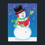 Carte postale de musique de chant de Noël de<br><div class="desc">Un bonhomme de neige chanteur exécute des chants de Noël dans la nuit. La neige et les notes musicales tombent doucement dans la carte postale de Noël.</div>