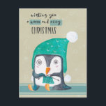 Carte postale de Noël de tricot de pingouin<br><div class="desc">Petits séance et tricot adorables de pingouin d'aquarelle avec un petit casquette doux d'hiver dessus avec des souhaits pour Noël chaud et confortable.</div>