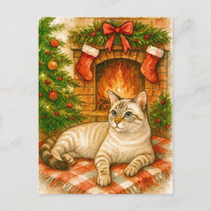 Carte postale de Noël douillette avec un chat près