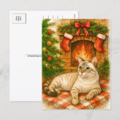 Carte postale de Noël douillette avec un chat près (Devant / Derrière)