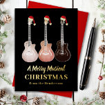 Carte Postale De Vacances En Aluminium Guitare Joyeux Noël musical Noir et Or<br><div class="desc">Noël vient d'avoir cool et de la musique avec cette guitare amoureux de la musique joyeuse personnalisée Noël carte de fête de la typographie or personnalisée. Trois guitares semi acoustiques rustiques de style rustique et occidental portant des chapeaux santa complètent ce design amusant et unique dessiné à la main. Oeuvre...</div>