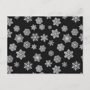 Carte Postale Des flocons d'argent sur un arrière - plan noir