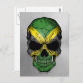 Carte Postale Drapeau de la Jamaïque sur un crâne en acier (Devant / Derrière)