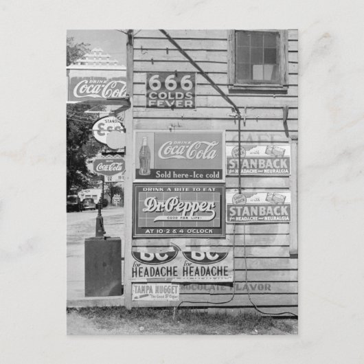 Carte Postale Enseignes sur un magasin général, 1938 (Devant)
