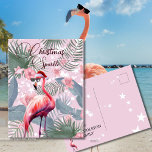 Carte Postale Flamant rose de Noël Lumières tropicales<br><div class="desc">Salutation de Noël personnalisée - Une étincelle de Noël tropicale Envoyez des salutations de Noël festives avec un peu de scintillement en utilisant cette carte postale personnalisée de Noël tropical étincelante avec un Flamant rose de Noël dans un chapeau de Père Noël. Faites-le vous-même, ajoutez des noms personnalisés et envoyez-le...</div>