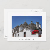 Carte Postale Fleurs de géranium et maisons de trulli à Alberobe (Devant / Derrière)