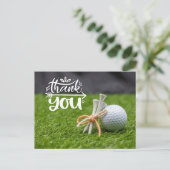 Carte Postale Golf ball et tee are on green grass merci (Debout devant)