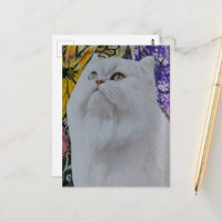 Joli chat blanc dans un collage de fleurs