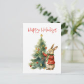 Carte Postale Joyeuses Fêtes - Lapin Mignon avec un Arbre de Noë (Debout devant)