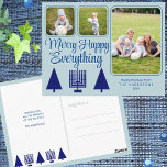 Carte Postale Joyeux Marine Famille Interconfessionnelle Enfants<br><div class="desc">Un collage photo carte postale de vacances modèle pour vous de personnaliser pour élégante marine et pastel bleu interconfessionnel Joyeux Happy Tout les salutations de vacances fait une brise pour créer vos propres cartes postales Chrismukkah. L'avant de ces cartes postales marines chic et bleu clair présente des arbres de Noël...</div>