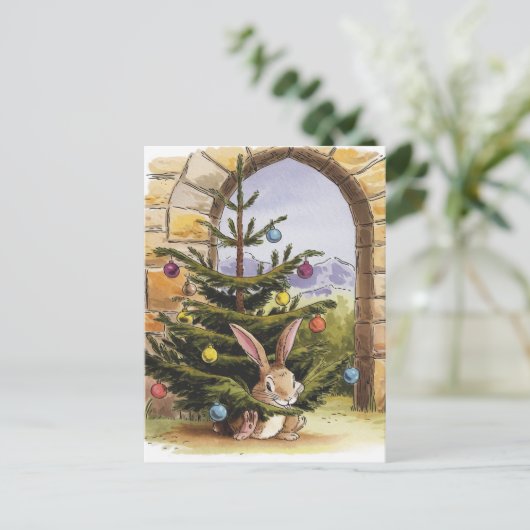 Carte Postale Le mignon lapin de Noël nibble l'arbre (Debout devant)