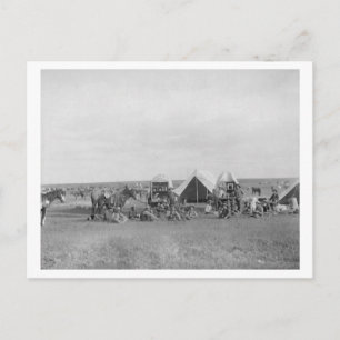 Carte Postale Les cow-boys assis autour du chariot photo