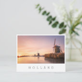 Carte Postale Lever de soleil sur une rivière gelée avec des mou (Debout devant)