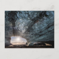 Looking out an ice cave, Iceland