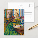 Carte Postale Madeleine Reading | Armand Guillaumin<br><div class="desc">Madeleine Guillaumin Lisant (1898) | Oeuvre originale du peintre et lithographe impressionniste français Armand Guillaumin (1841-1927). La pièce représente une jeune fille en robe verte et en arc de cheveux rouge assis à une table, lisant un livre. Utilisez les outils de conception pour ajouter du texte personnalisé ou personnaliser l'image....</div>