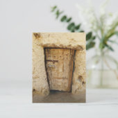 Carte Postale Maison en briques de boue avec vieille porte Siwa  (Debout devant)