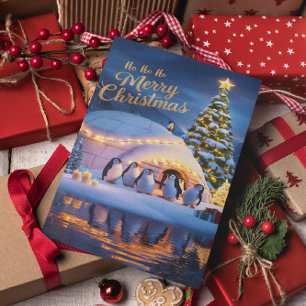 Carte Postale Manchots fêtent dans un igloo avec un arbre de Noë