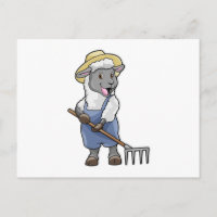 Mouton en fermier avec râteau et chapeau