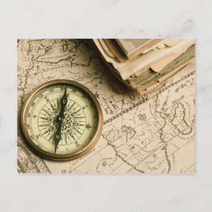 Carte Postale Old compass over Ancient Map