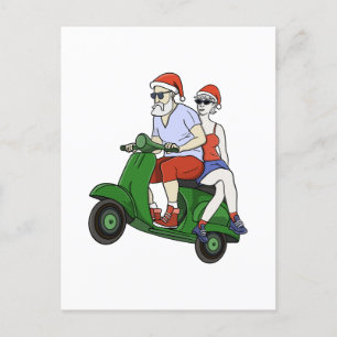 Carte Postale Père Noël et Mme Claus chevauchant un scooter