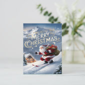 Carte Postale Père Noël festif glisse dans la pente enneigée (Debout devant)