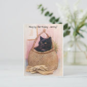 Carte Postale Petit chat noir dans un panier près de gants de ja (Debout devant)