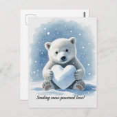Carte Postale Polar bear in the snow with heart shaped snowball (Devant / Derrière)