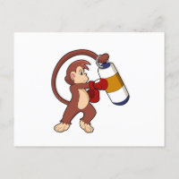 Singe à la boxe avec sac de frappe