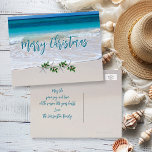 Carte postale Tropical Merry Christmas Ocean Beach<br><div class="desc">Salutation de Noël tropicale,  carte postale abordable. Customisez tout le texte avec l'océan et le sable de plage comme image arrière - plan. Économisez de l'argent avec ce type de carte.</div>