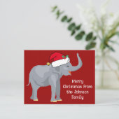 Carte Postale Un éléphant de Noël drôle dans le chapeau rouge du (Debout devant)