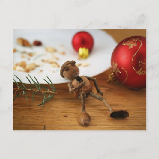 Carte Postale Un elfe de maïs qui mange un biscuit - Noël (Devant)