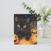 Carte Postale Un mignon chat noir en Citrouille d'Halloween (Debout devant)