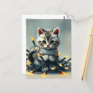 Carte Postale Un mignon chaton enveloppé dans les lumières de No