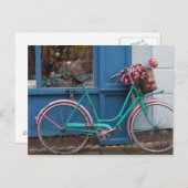 Carte Postale Un vélo rose avec panier en osier et fleurs (Devant / Derrière)