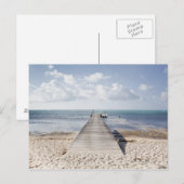 Carte Postale Une longue jetée avec un bateau au bout s'étire (Devant / Derrière)