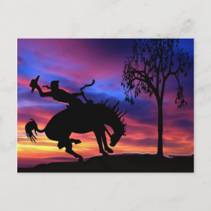 Carte Postale Une silhouette de cowboy au coucher du soleil