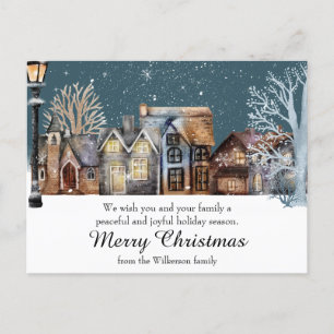 Carte Postale Village d'hiver cosy la nuit sous la neige qui tom