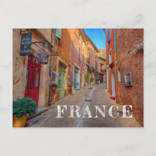 Carte Postale Ville française colorée sur une colline
