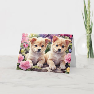 Carte Puppies cuter dans l'aquarelle du jardin fleuri