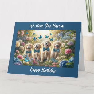 Carte Quatre chiots Golden Retriever avec des papillons