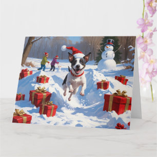 Carte Rat Terrier courant dans la neige avec un chapeau