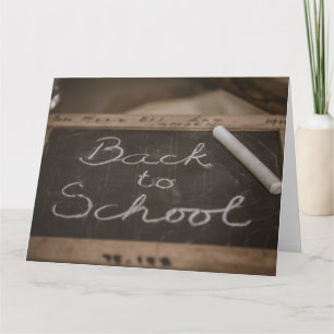 Carte Retour à l'école sur un tableau d'école ancien