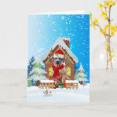 Carte Rhodesian Rdgeback dans la neige avec des cadeaux  (Fleur jaune)