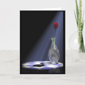Carte rose dans un vase