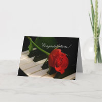 Rose rouge sur Piano Keys-Bravissimo!