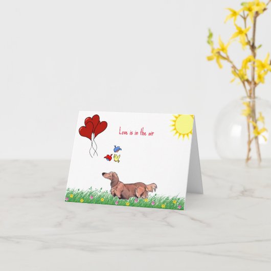 Carte Saint-Valentin teckel à longs poils  (Fleur jaune)