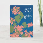 Carte Salmon Pink Geraniums on Deep Blue, 60th Birthday<br><div class="desc">Jolie carte d'anniversaire du 60ème anniversaire,  avec des géraniums saumon sur fond bleu profond et des lettres blanches élégantes. À partir d'un design imprimé à l'écran par Judy Adamson,  vous pouvez personnaliser le message intérieur si vous le souhaitez.</div>