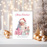 Carte Santa Claus, Arbres de Noël et Cavaliers<br><div class="desc">Sur la carte de Noël extraordinaire,  un Père Noël vintage et un casse-noix se tiennent parmi les cadeaux enveloppés de papier bleu avec des arbres de Noël roses</div>